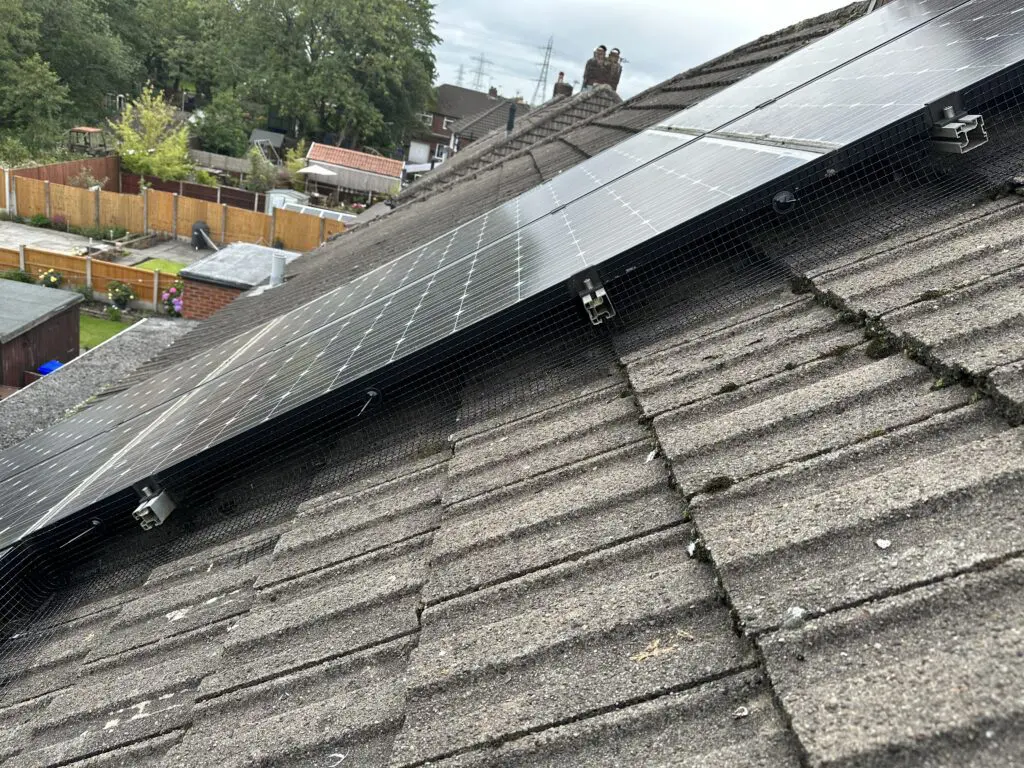 Solar panel bird proofing with mesh.