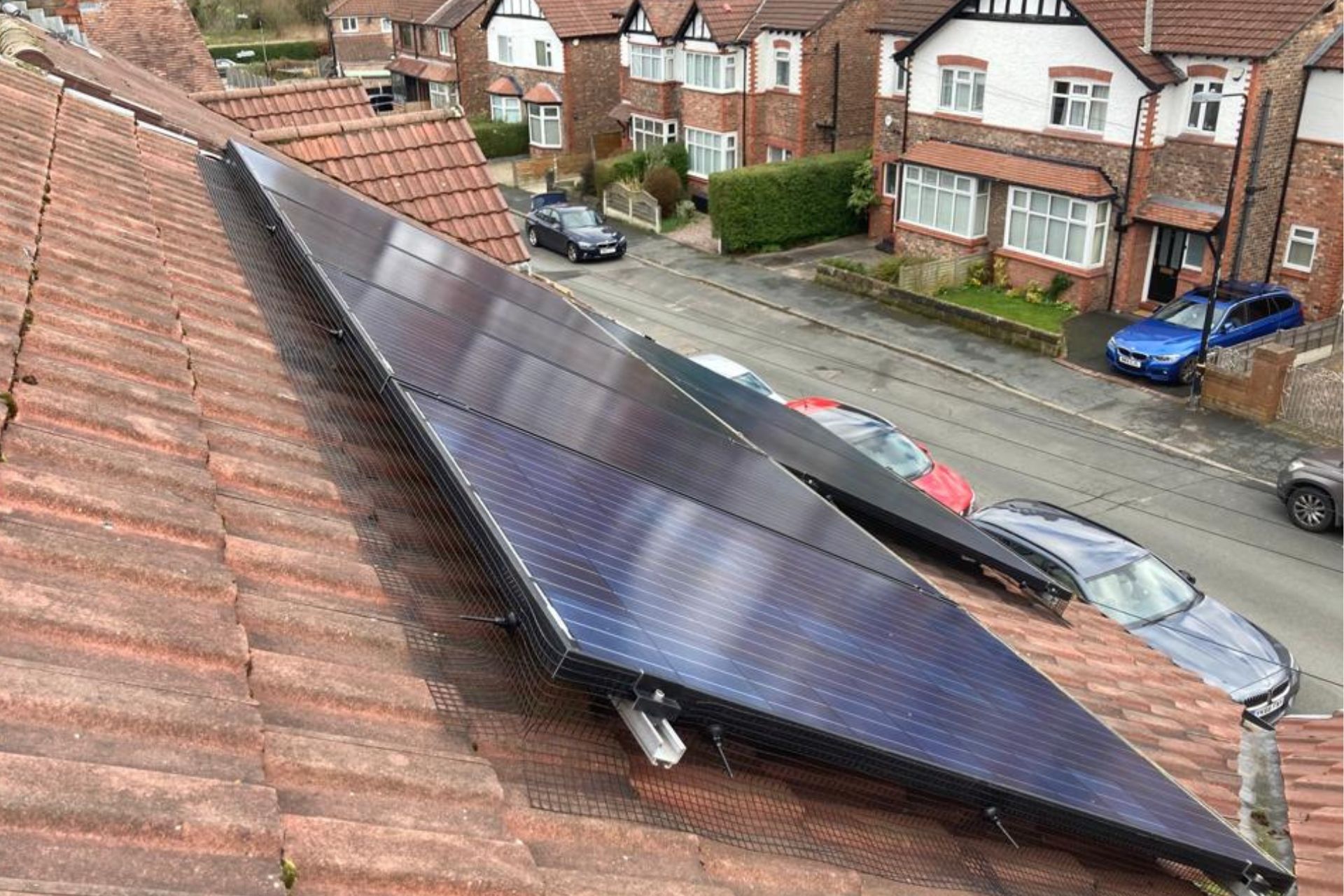 Solar panels with bird proofing black pvc coated galvanised mesh.