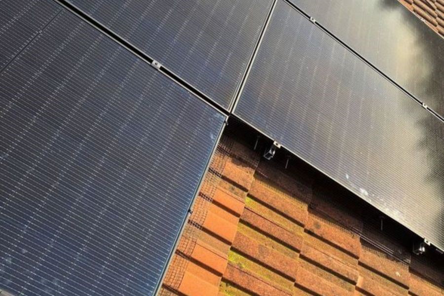 Black galvanised mesh on a solar panel.